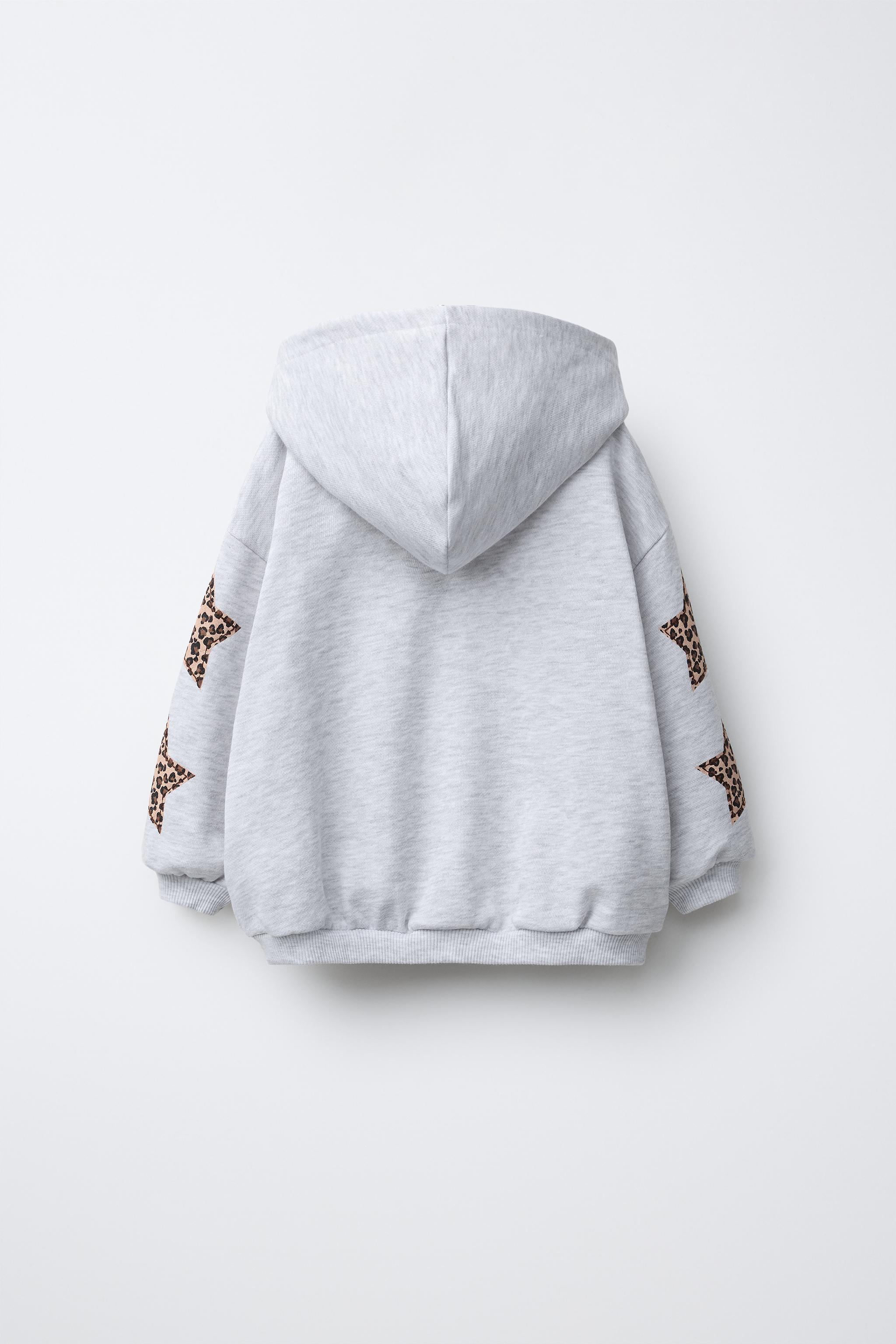 SWEAT À CAPUCHE PIÈCES ÉTOILES ANIMAL PRINT
